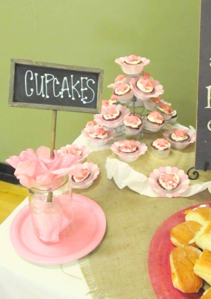 cupcakes on a cupcake stand themed for this cowgirl bridal shower