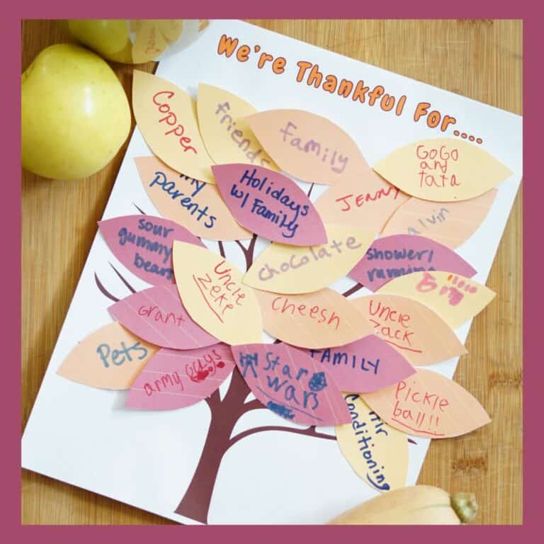 Completed Gratitude Tree with lots of "leaves" that family has filled out with what each person is thankful for