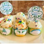 Mini cupcakes decorated with St. Patrick's day cupcake wrappers and cupcake toppers