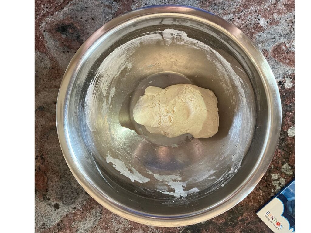 bowl of salt dough for making Dino tracks fossil craft