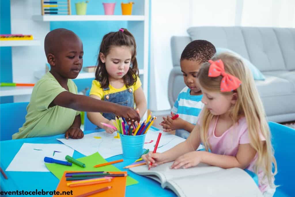 Kids having fun and working on a summer craft activity page