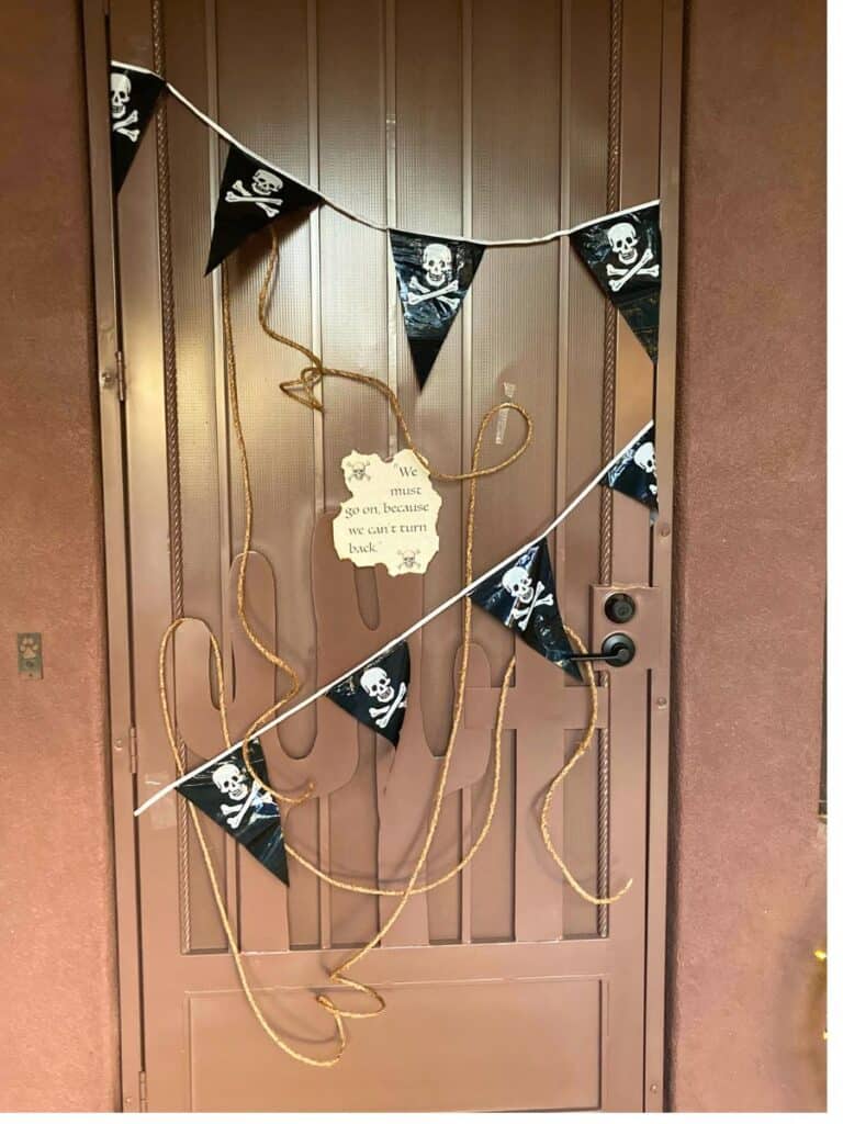 The whole front door decorated for a pirate party. 