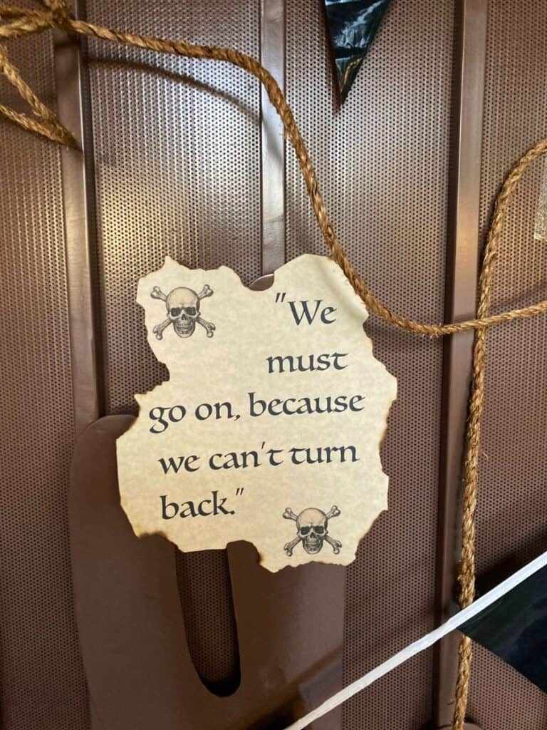Front door featuring a quote from Treasure Island for this Pirate party for kids.