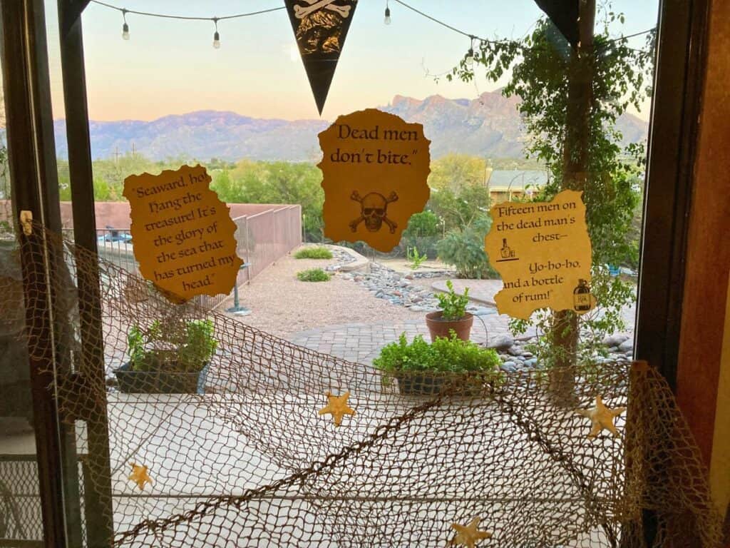 Close-up of Treasure Island quotes for pirate party decorations. 