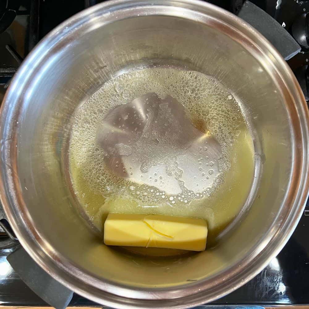 Melting butter to make unicorn Rice Krispie treats