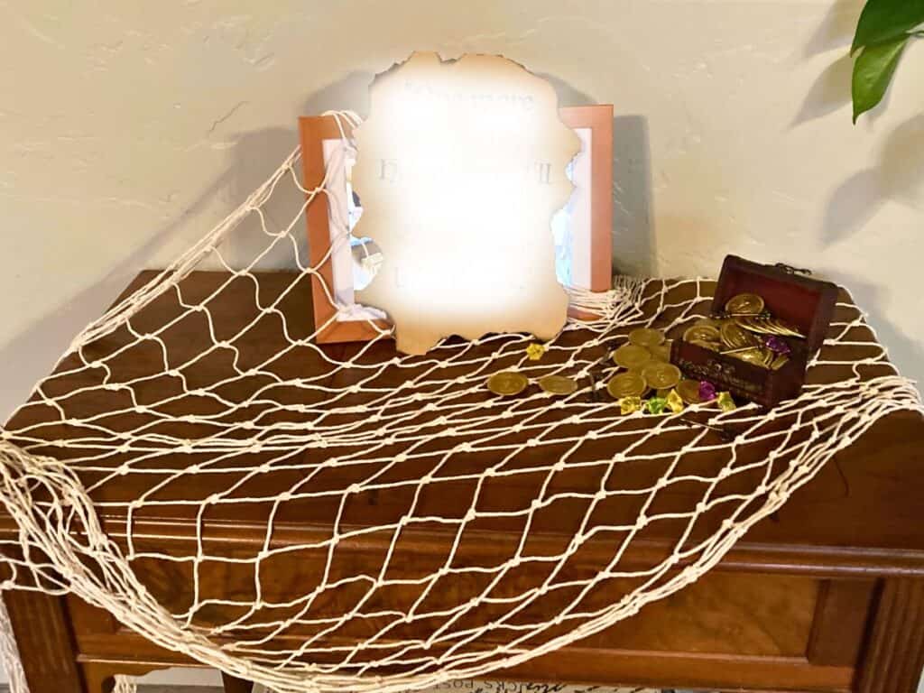 The entry table decorated with pirate party decor